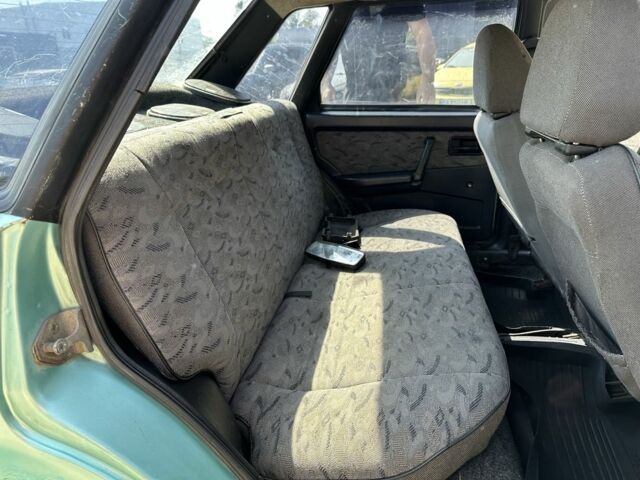 Зеленый ВАЗ 21099, объемом двигателя 1.5 л и пробегом 178 тыс. км за 1099 $, фото 9 на Automoto.ua