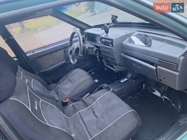 Зеленый ВАЗ 21099, объемом двигателя 1.5 л и пробегом 313 тыс. км за 850 $, фото 18 на Automoto.ua