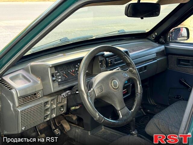 Зелений ВАЗ 21099, об'ємом двигуна 1.5 л та пробігом 300 тис. км за 1899 $, фото 7 на Automoto.ua
