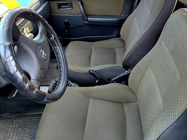 Зеленый ВАЗ 21099, объемом двигателя 1.5 л и пробегом 139 тыс. км за 2100 $, фото 4 на Automoto.ua