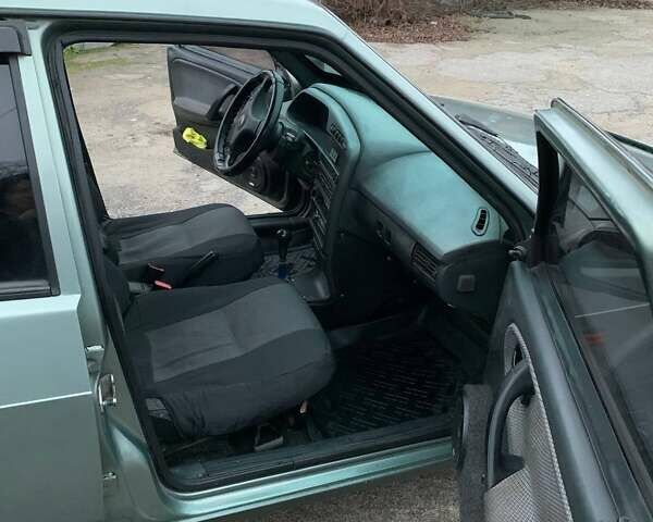 Зеленый ВАЗ 21099, объемом двигателя 1.6 л и пробегом 203 тыс. км за 2000 $, фото 3 на Automoto.ua