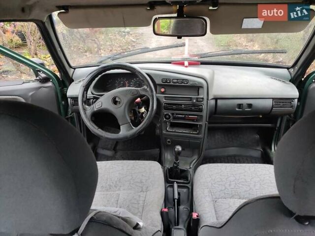 Зелений ВАЗ 21099, об'ємом двигуна 1.6 л та пробігом 450 тис. км за 1000 $, фото 5 на Automoto.ua