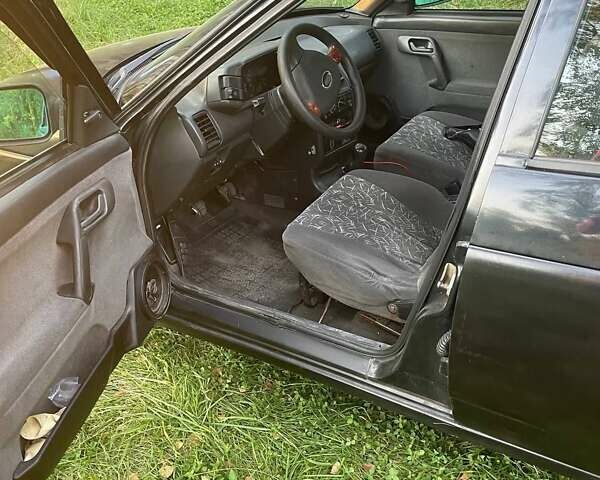 Черный ВАЗ 2110, объемом двигателя 1.5 л и пробегом 160 тыс. км за 1900 $, фото 4 на Automoto.ua