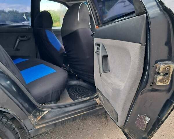 Черный ВАЗ 2110, объемом двигателя 1.5 л и пробегом 319 тыс. км за 1250 $, фото 4 на Automoto.ua