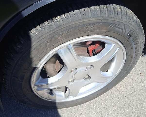 Черный ВАЗ 2110, объемом двигателя 1.6 л и пробегом 190 тыс. км за 3500 $, фото 9 на Automoto.ua