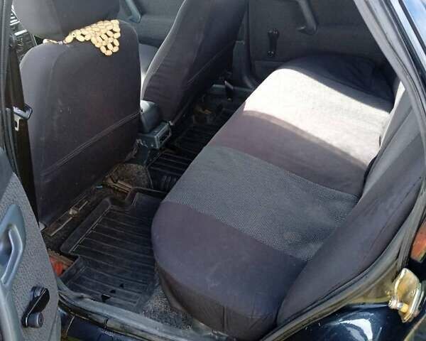 Черный ВАЗ 2110, объемом двигателя 1.6 л и пробегом 267 тыс. км за 1800 $, фото 4 на Automoto.ua