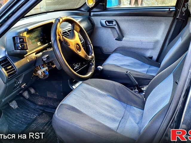 Черный ВАЗ 2110, объемом двигателя 1.6 л и пробегом 256 тыс. км за 999 $, фото 5 на Automoto.ua
