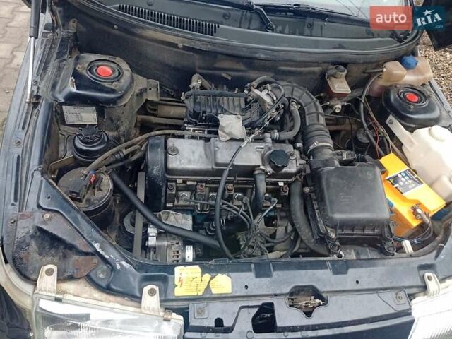 Черный ВАЗ 2110, объемом двигателя 1.6 л и пробегом 206 тыс. км за 1550 $, фото 10 на Automoto.ua