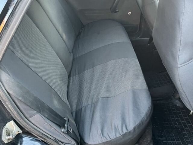 Черный ВАЗ 2110, объемом двигателя 1.6 л и пробегом 185 тыс. км за 1100 $, фото 5 на Automoto.ua