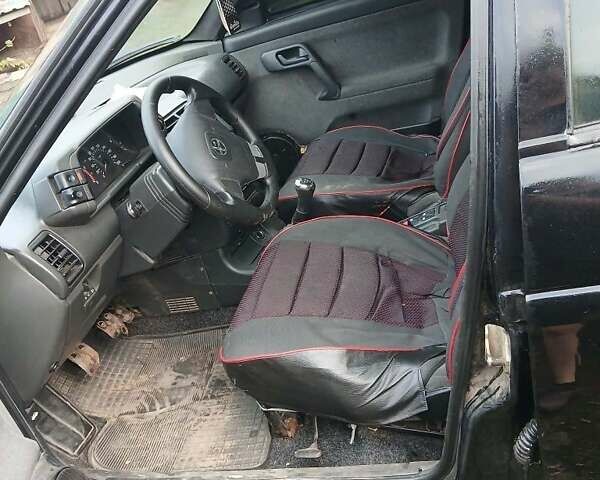 Черный ВАЗ 2110, объемом двигателя 1.6 л и пробегом 180 тыс. км за 2000 $, фото 2 на Automoto.ua