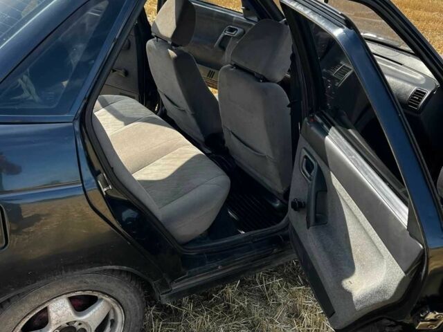 Чорний ВАЗ 2110, об'ємом двигуна 1.6 л та пробігом 175 тис. км за 1201 $, фото 3 на Automoto.ua