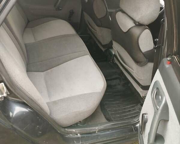 Чорний ВАЗ 2110, об'ємом двигуна 1.6 л та пробігом 208 тис. км за 1999 $, фото 18 на Automoto.ua