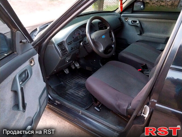 Черный ВАЗ 2110, объемом двигателя 1.6 л и пробегом 300 тыс. км за 1650 $, фото 6 на Automoto.ua