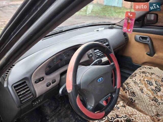 Черный ВАЗ 2110, объемом двигателя 1.6 л и пробегом 149 тыс. км за 2000 $, фото 12 на Automoto.ua