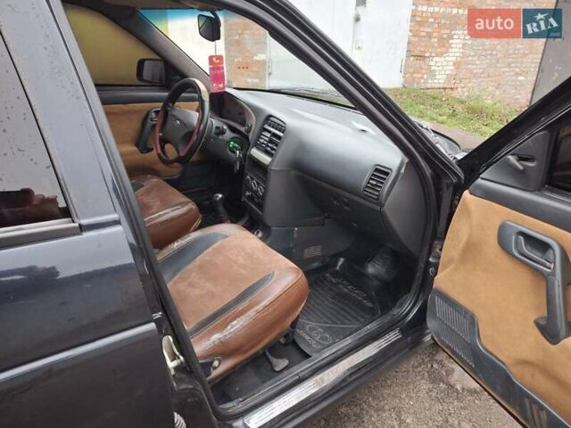 Черный ВАЗ 2110, объемом двигателя 1.6 л и пробегом 149 тыс. км за 2000 $, фото 11 на Automoto.ua