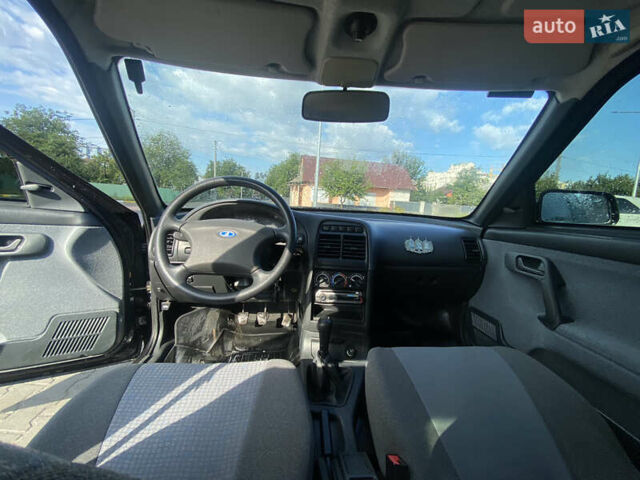 Черный ВАЗ 2110, объемом двигателя 1.6 л и пробегом 40 тыс. км за 3999 $, фото 4 на Automoto.ua