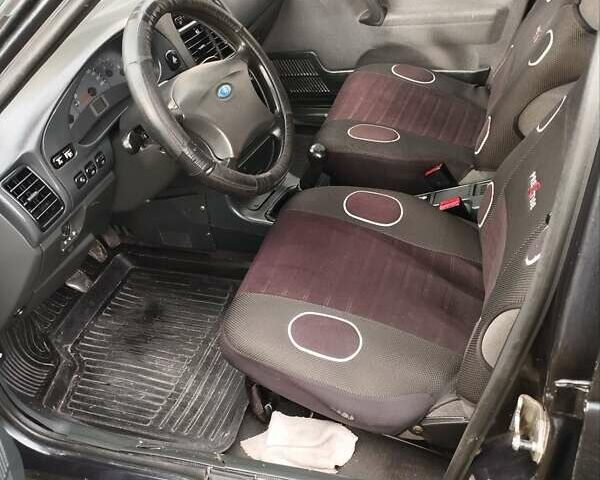 Чорний ВАЗ 2110, об'ємом двигуна 1.6 л та пробігом 208 тис. км за 1999 $, фото 20 на Automoto.ua