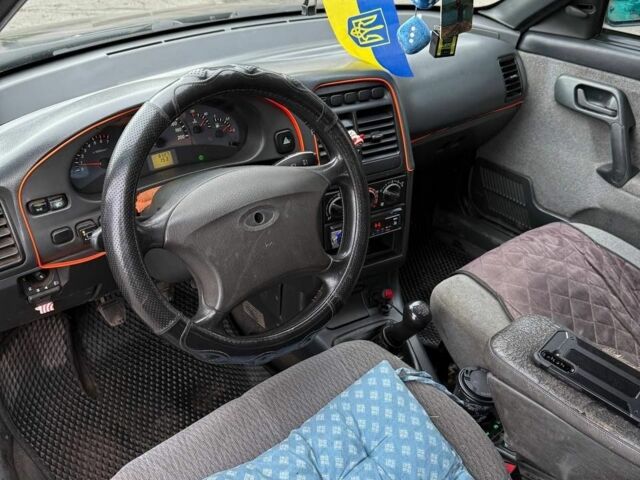 Черный ВАЗ 2110, объемом двигателя 1.6 л и пробегом 200 тыс. км за 2000 $, фото 5 на Automoto.ua