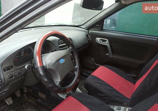 Черный ВАЗ 2110, объемом двигателя 1.6 л и пробегом 230 тыс. км за 1650 $, фото 5 на Automoto.ua