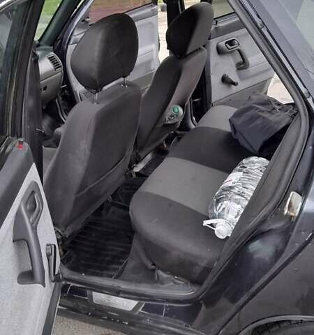 Черный ВАЗ 2110, объемом двигателя 1.62 л и пробегом 194 тыс. км за 2000 $, фото 1 на Automoto.ua