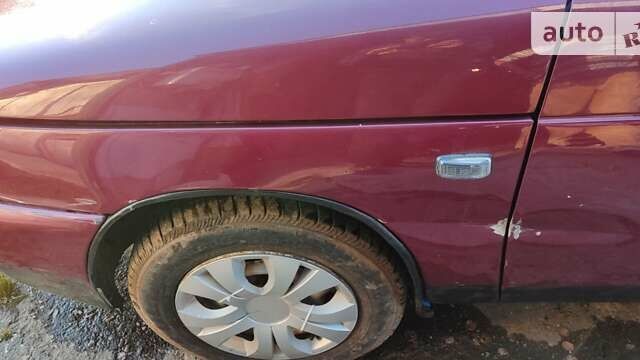 Красный ВАЗ 2110, объемом двигателя 1.5 л и пробегом 156 тыс. км за 1550 $, фото 7 на Automoto.ua