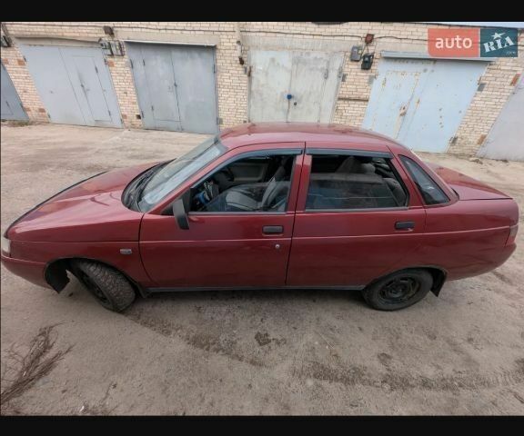 Красный ВАЗ 2110, объемом двигателя 1.5 л и пробегом 233 тыс. км за 1500 $, фото 2 на Automoto.ua