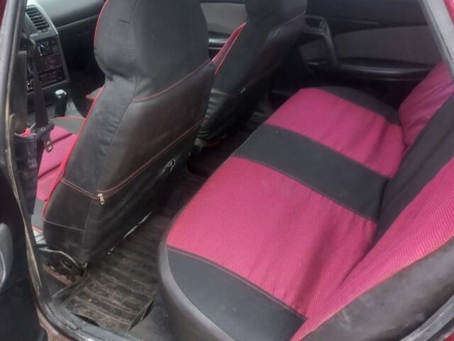 Красный ВАЗ 2110, объемом двигателя 1.5 л и пробегом 350 тыс. км за 2126 $, фото 5 на Automoto.ua