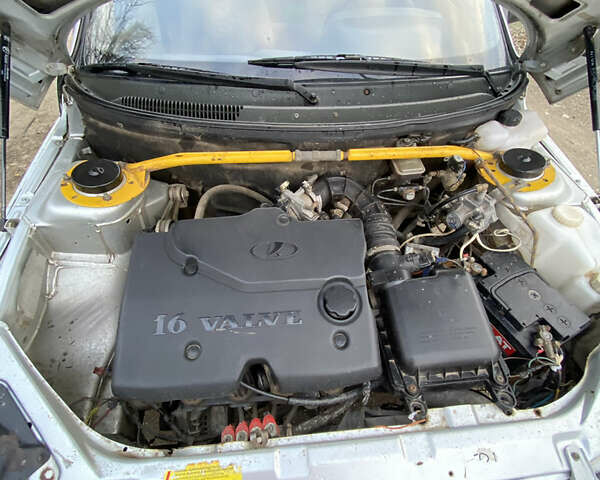 Красный ВАЗ 2110, объемом двигателя 1 л и пробегом 140 тыс. км за 1750 $, фото 6 на Automoto.ua