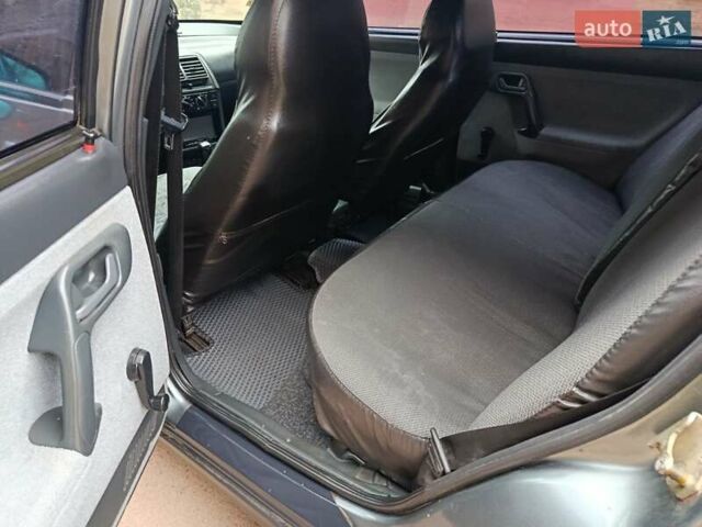 Серый ВАЗ 2110, объемом двигателя 1.6 л и пробегом 178 тыс. км за 1999 $, фото 19 на Automoto.ua