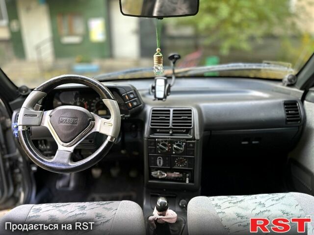 Серый ВАЗ 2110, объемом двигателя 1.6 л и пробегом 199 тыс. км за 2000 $, фото 4 на Automoto.ua