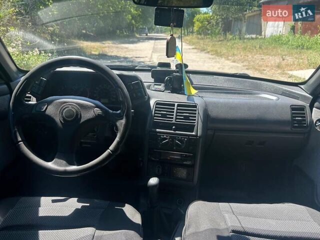 Серый ВАЗ 2110, объемом двигателя 1.6 л и пробегом 245 тыс. км за 2000 $, фото 9 на Automoto.ua