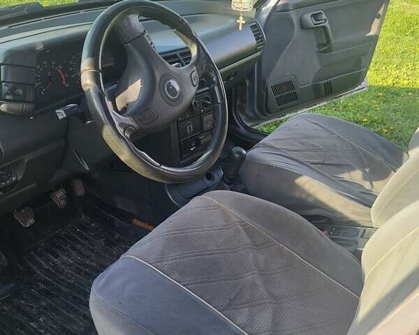 Серый ВАЗ 2110, объемом двигателя 1.6 л и пробегом 164 тыс. км за 2000 $, фото 5 на Automoto.ua