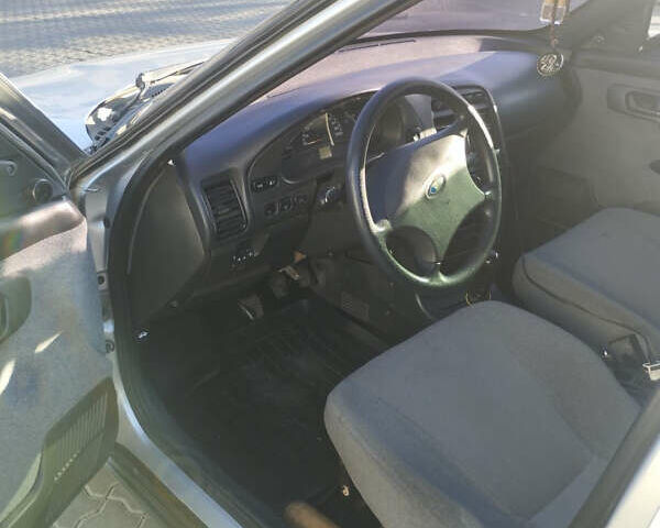 Серый ВАЗ 2110, объемом двигателя 1.6 л и пробегом 133 тыс. км за 2100 $, фото 4 на Automoto.ua