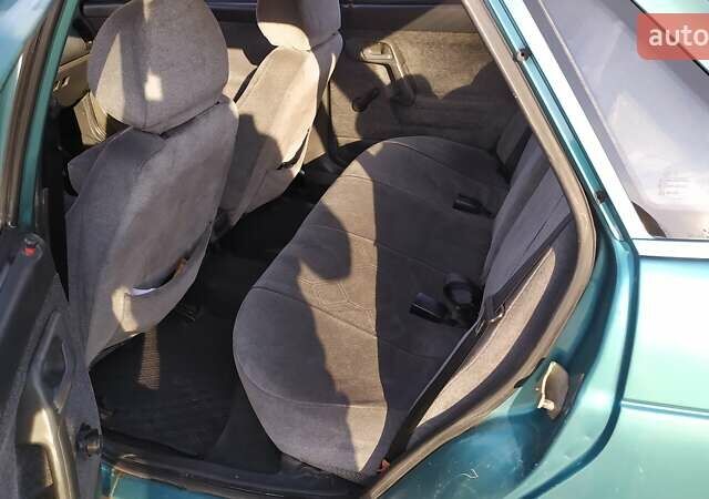 Зеленый ВАЗ 2110, объемом двигателя 1.5 л и пробегом 186 тыс. км за 1299 $, фото 11 на Automoto.ua