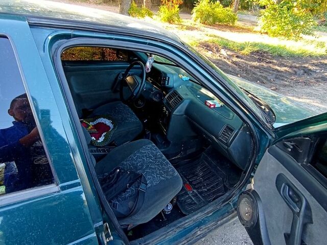 Зеленый ВАЗ 2110, объемом двигателя 1.5 л и пробегом 248 тыс. км за 1400 $, фото 4 на Automoto.ua