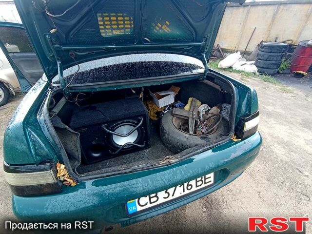 Зеленый ВАЗ 2110, объемом двигателя 1.5 л и пробегом 248 тыс. км за 1400 $, фото 6 на Automoto.ua