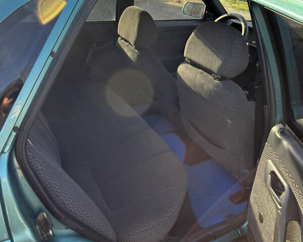 Зелений ВАЗ 2110, об'ємом двигуна 1.5 л та пробігом 245 тис. км за 1350 $, фото 9 на Automoto.ua