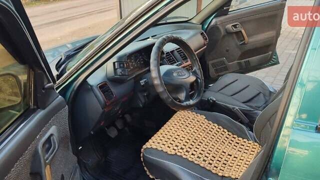 Зеленый ВАЗ 2110, объемом двигателя 1.5 л и пробегом 200 тыс. км за 1600 $, фото 4 на Automoto.ua