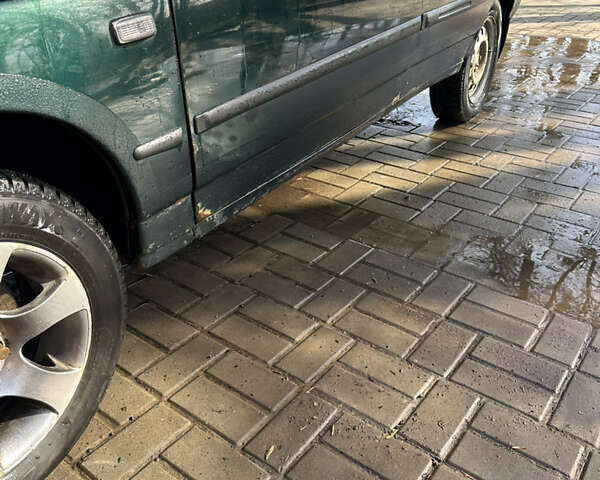 Зеленый ВАЗ 2110, объемом двигателя 1.5 л и пробегом 310 тыс. км за 1700 $, фото 5 на Automoto.ua