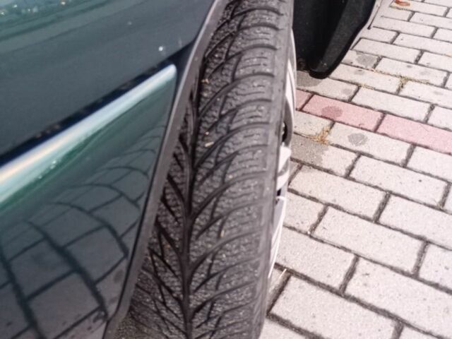 Зеленый ВАЗ 2110, объемом двигателя 1 л и пробегом 300 тыс. км за 1400 $, фото 4 на Automoto.ua