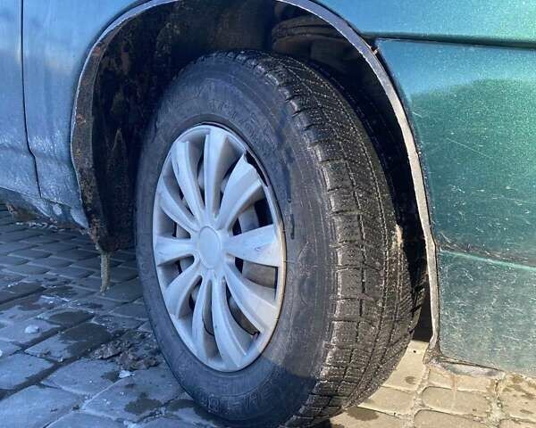 Зеленый ВАЗ 2110, объемом двигателя 1.5 л и пробегом 249 тыс. км за 1200 $, фото 4 на Automoto.ua