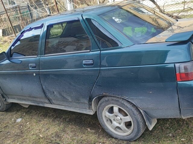 Зеленый ВАЗ 2110, объемом двигателя 1 л и пробегом 215 тыс. км за 800 $, фото 2 на Automoto.ua