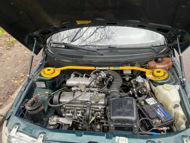 Зеленый ВАЗ 2110, объемом двигателя 1 л и пробегом 137 тыс. км за 1550 $, фото 9 на Automoto.ua