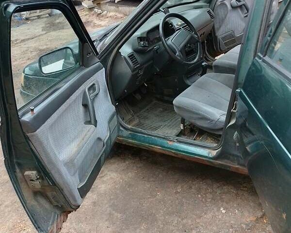 Зеленый ВАЗ 2110, объемом двигателя 1.5 л и пробегом 425 тыс. км за 635 $, фото 3 на Automoto.ua
