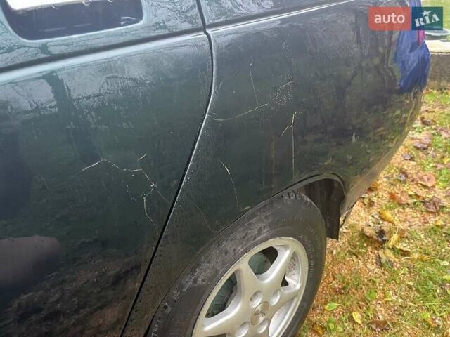 Зеленый ВАЗ 2110, объемом двигателя 1.5 л и пробегом 300 тыс. км за 700 $, фото 2 на Automoto.ua