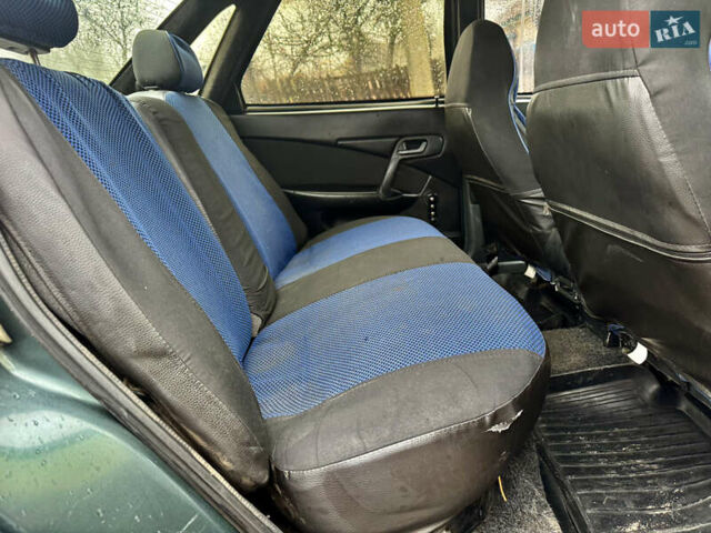 Зелений ВАЗ 2110, об'ємом двигуна 1.6 л та пробігом 200 тис. км за 1999 $, фото 11 на Automoto.ua