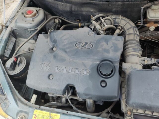 Зеленый ВАЗ 2110, объемом двигателя 1.6 л и пробегом 303 тыс. км за 1419 $, фото 4 на Automoto.ua