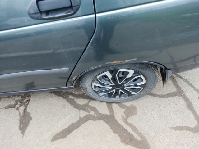 Зеленый ВАЗ 2110, объемом двигателя 1.6 л и пробегом 303 тыс. км за 1419 $, фото 7 на Automoto.ua