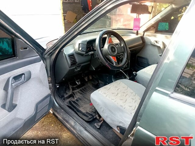 Зеленый ВАЗ 2110, объемом двигателя 1.6 л и пробегом 225 тыс. км за 1700 $, фото 1 на Automoto.ua