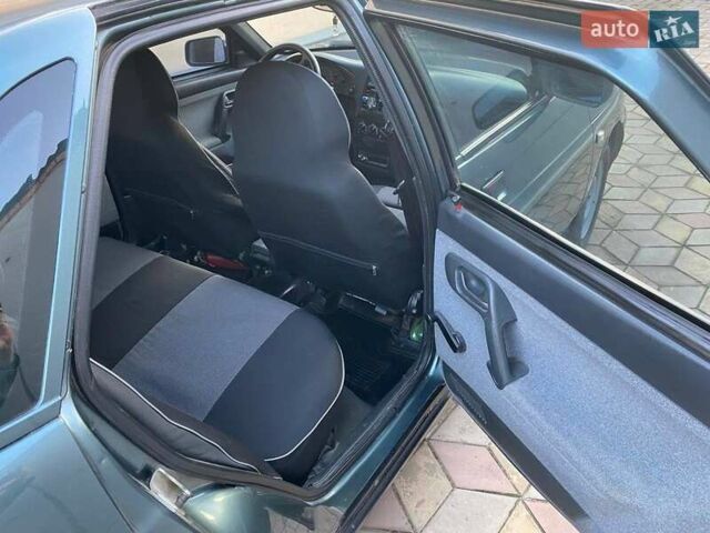 Зеленый ВАЗ 2110, объемом двигателя 1.6 л и пробегом 104 тыс. км за 3400 $, фото 6 на Automoto.ua